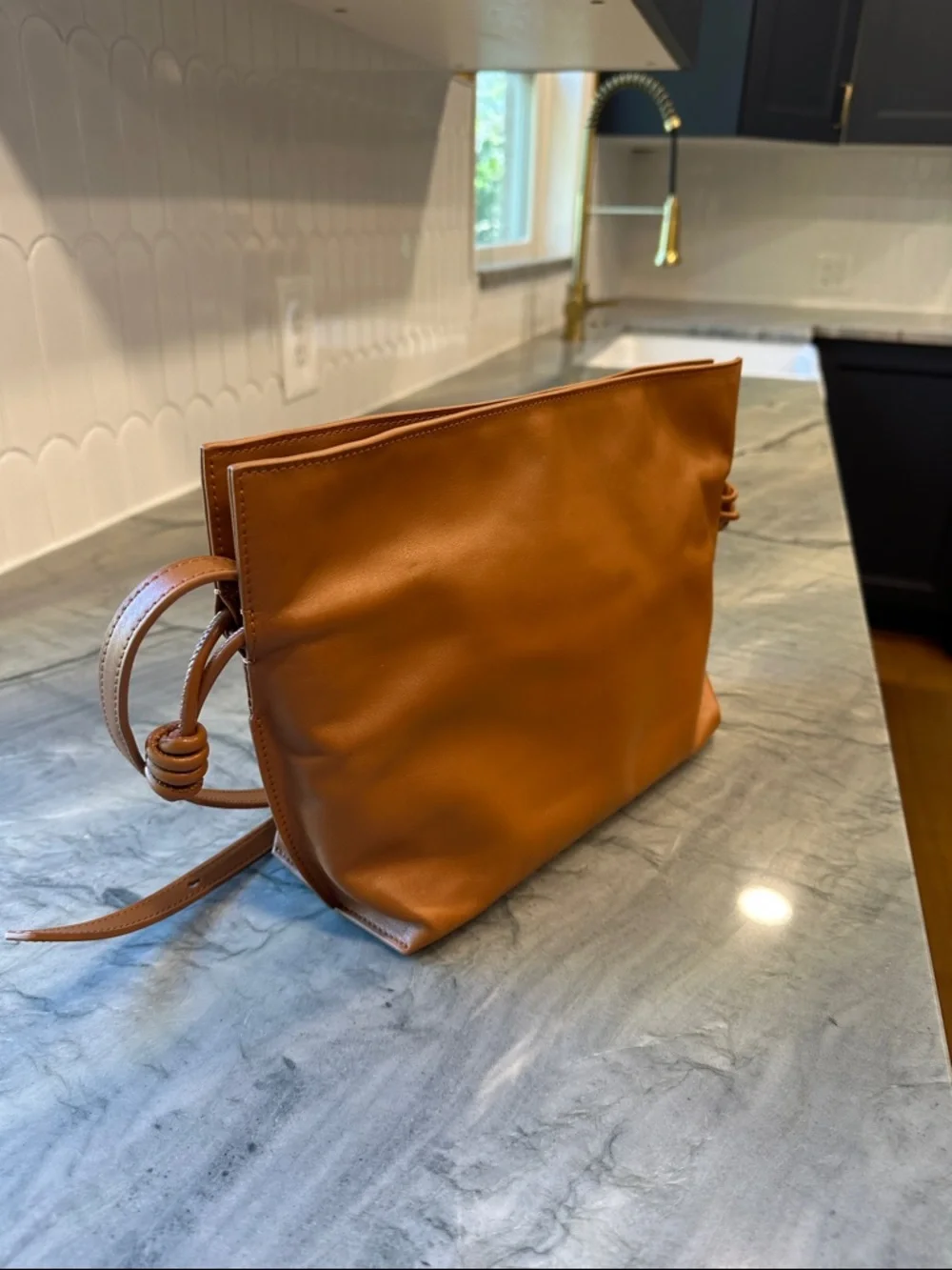 Quince Italian Leather Drawstring Pouch Crossbody Bag in Cognac - Picture 4 of 16
